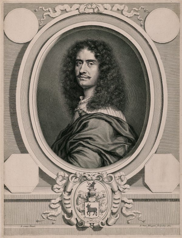 An oval frame of a men with long hair. There is a medallion below the frame with an animal.