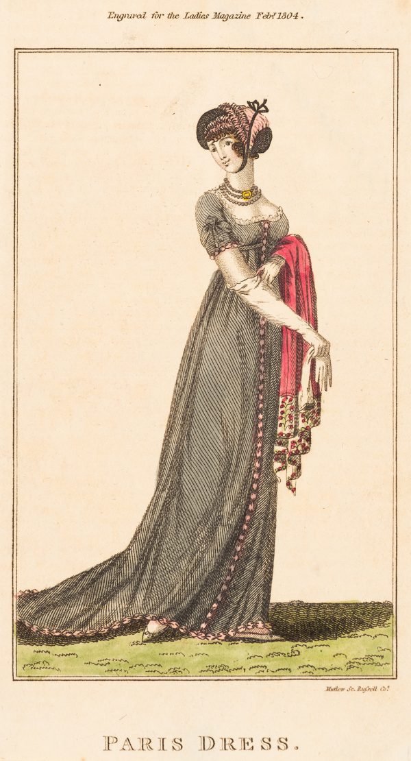 Fashion Print, woman standing on green grass. She has elbow lenght gloves and a red shawl is draped over her left arm.