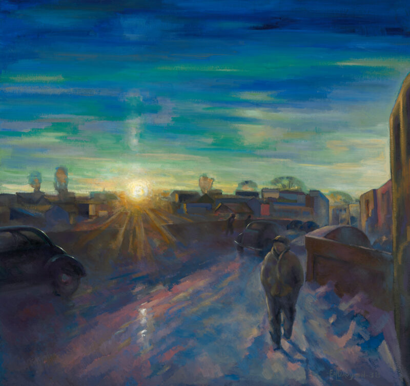 A setting sun over a snow covered street with a figure at center.