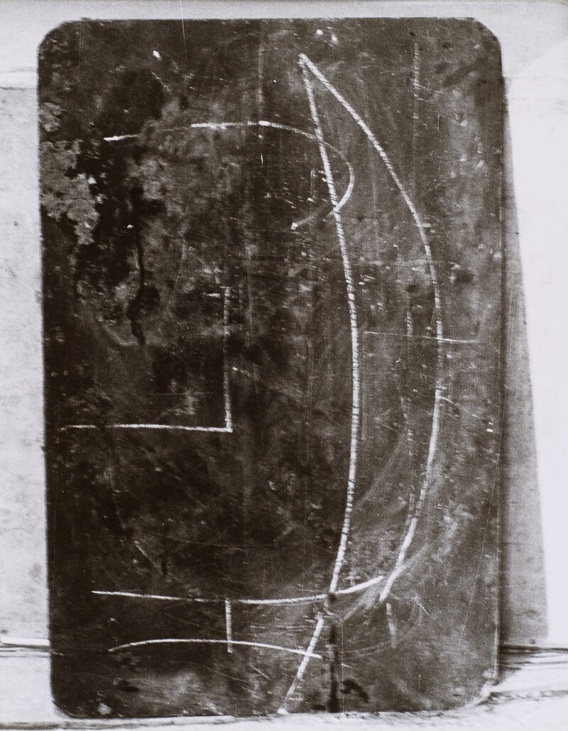 Chalkboard. Still photograph from a performance piece which took place in Basel, Switzerland in 1971.