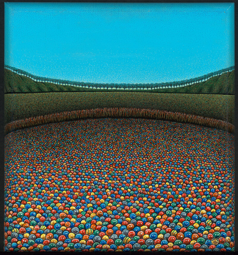 Various colored gumballs are seen fading into the distance.