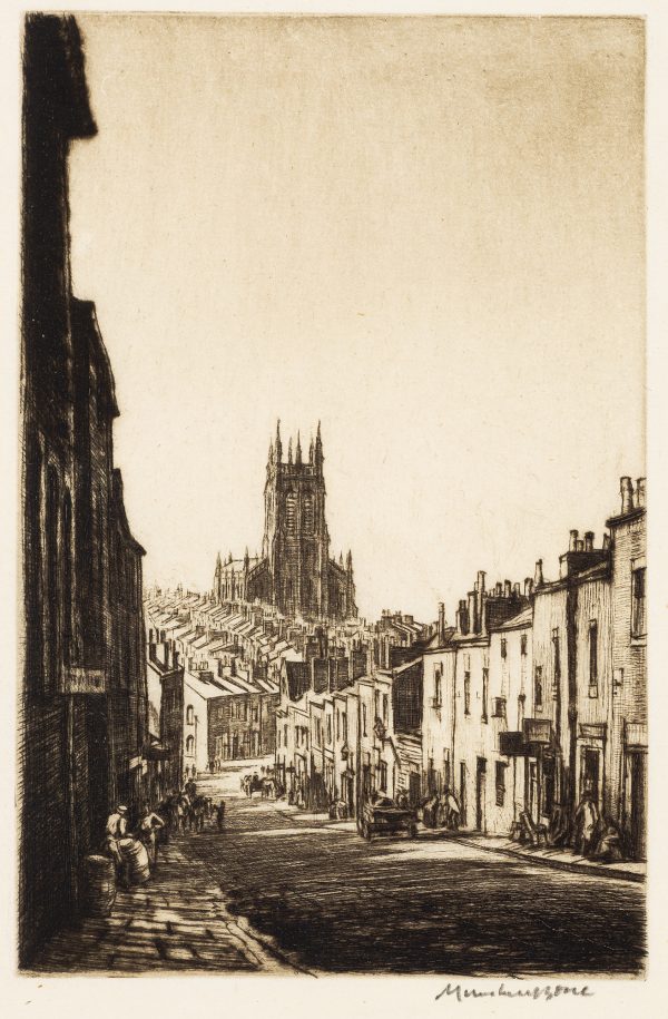 A street scene with Gothic buildings rising up on each side.