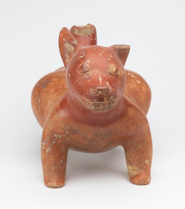 In red polished clay a fat dog with large ears.