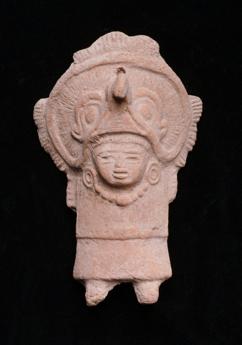 Figure with bird headdress.