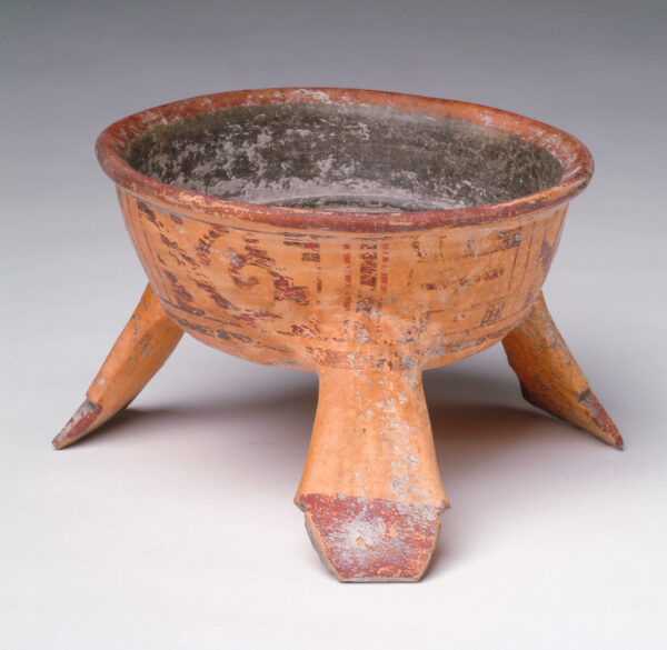 Tripod bowl with relief grid interior