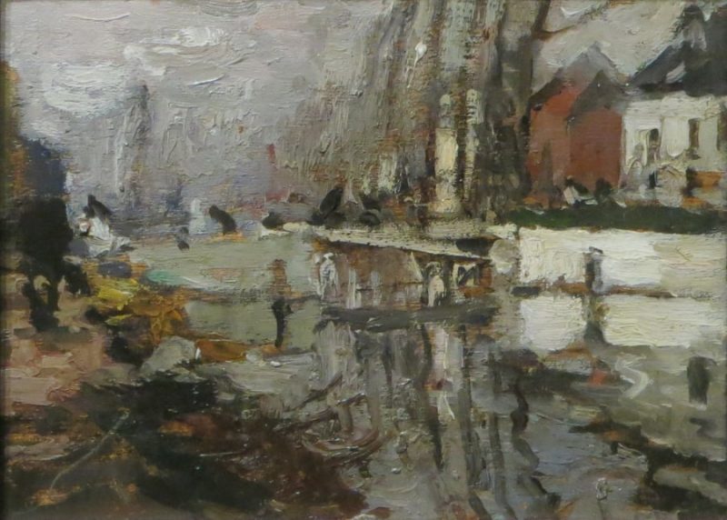 A scene of boats, water and buildings.