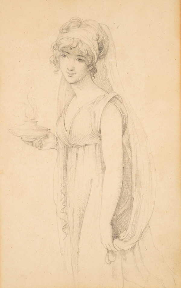 A woman stands holding a candle