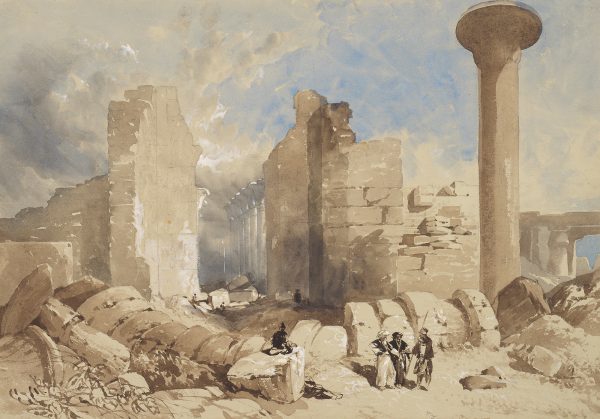 Three figures in Egyptian ruins.