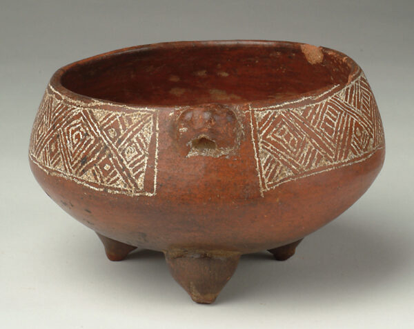 Tripod bowl with incised band.