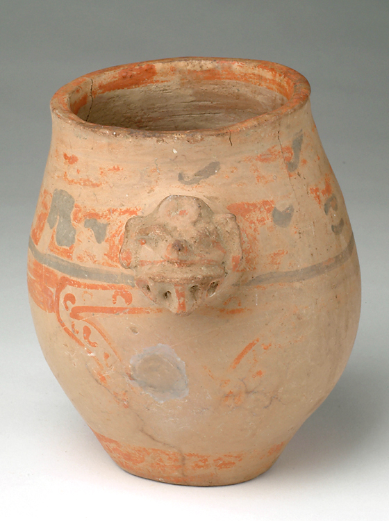 Effigy vessel with tan body, orange slip, animal head.