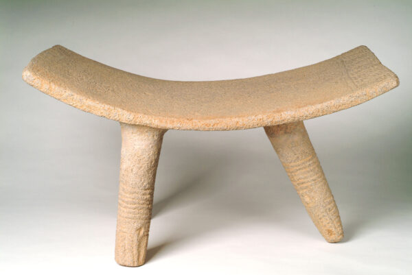 Tripod metate with curved top, long legs