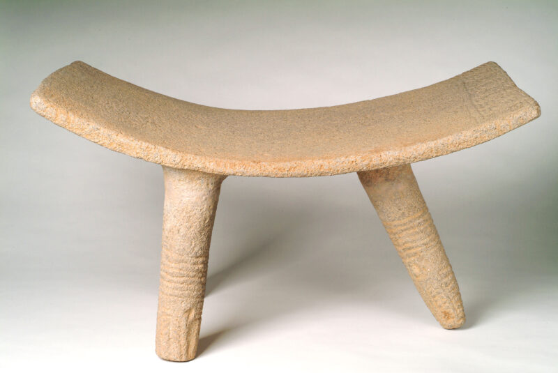 Tripod metate with curved top, long legs