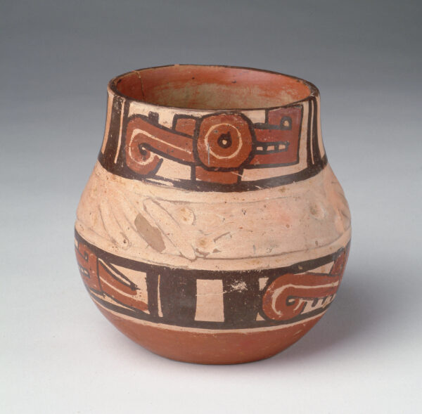 A round bottom vase with tan, red and black slip decoration.