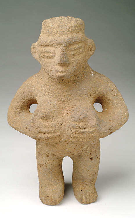 Standing Figure of Warrior Holding Two Heads