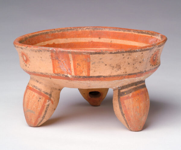Tripod bowl: tan body with red and black slip decoration.