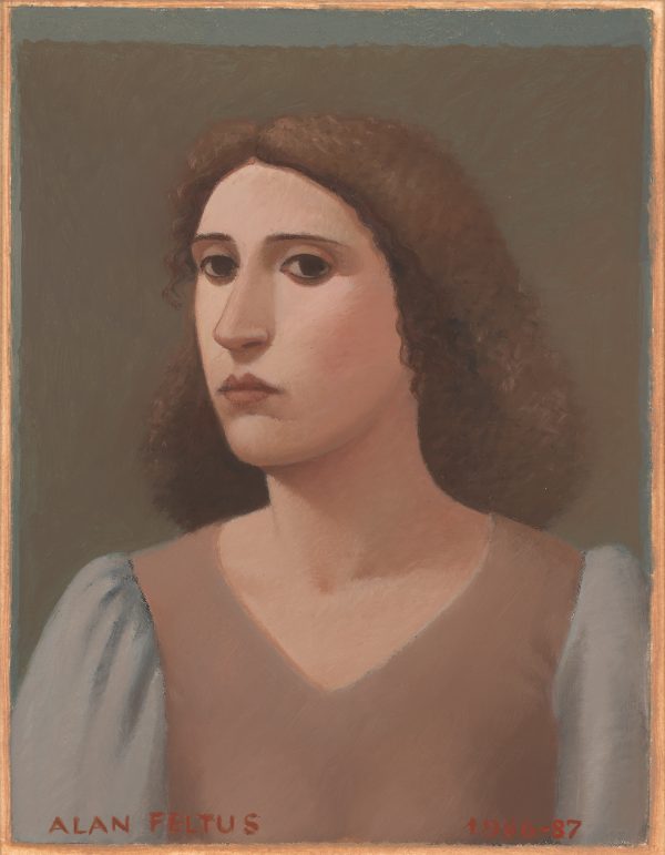 A portrait of a woman with dark hair.