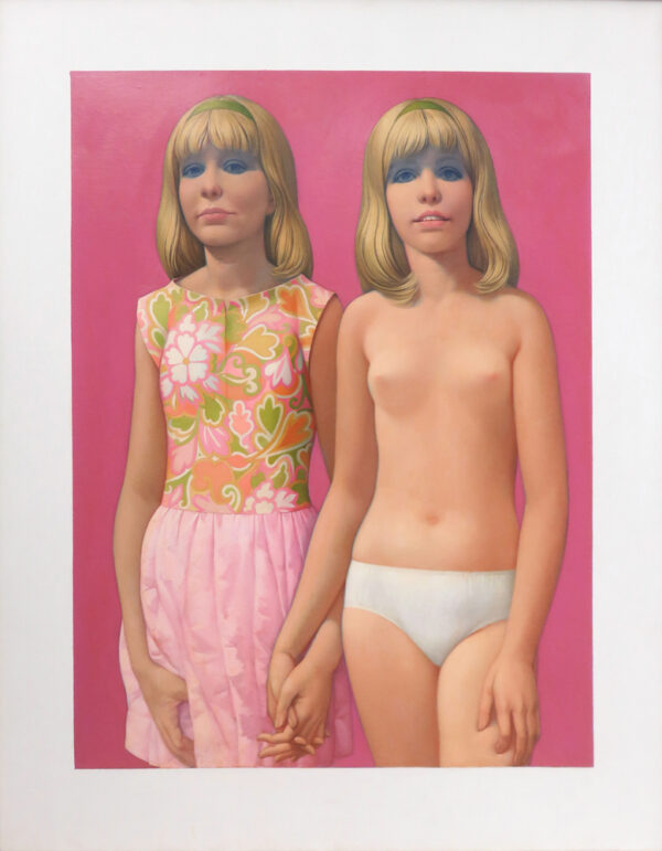 Two girls, one clothed stand holding hands.