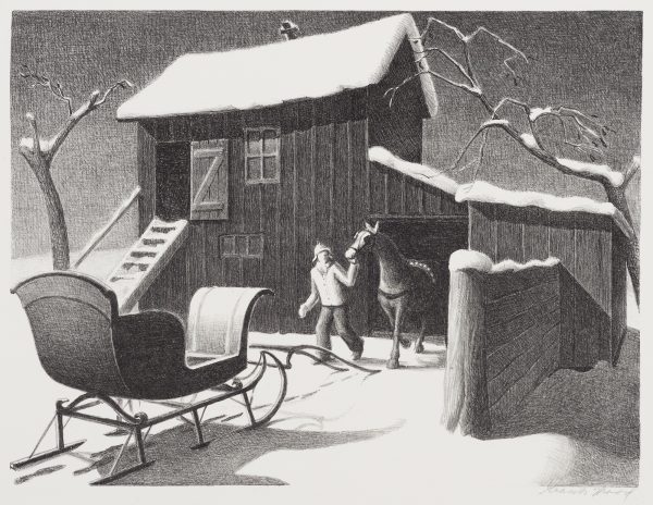 A man leads a horse from a barn towards a sleigh.