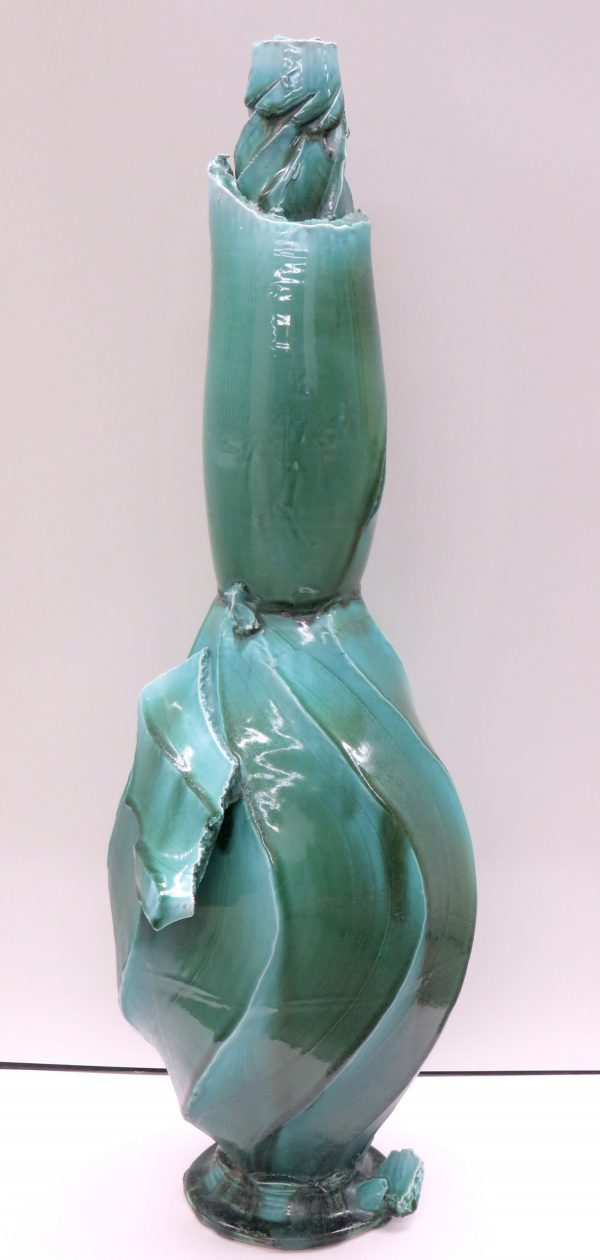 A slab built, tall green, vase