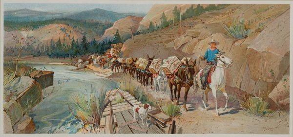 In a mountainous terrain a small dog greets a man on horseback leading a line of pack mules.