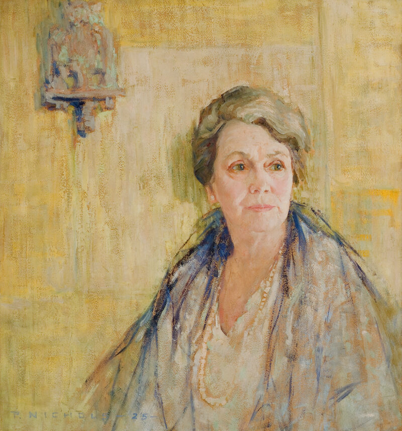 Portrait of a woman in front of a wall with a sconce above her head to the left.