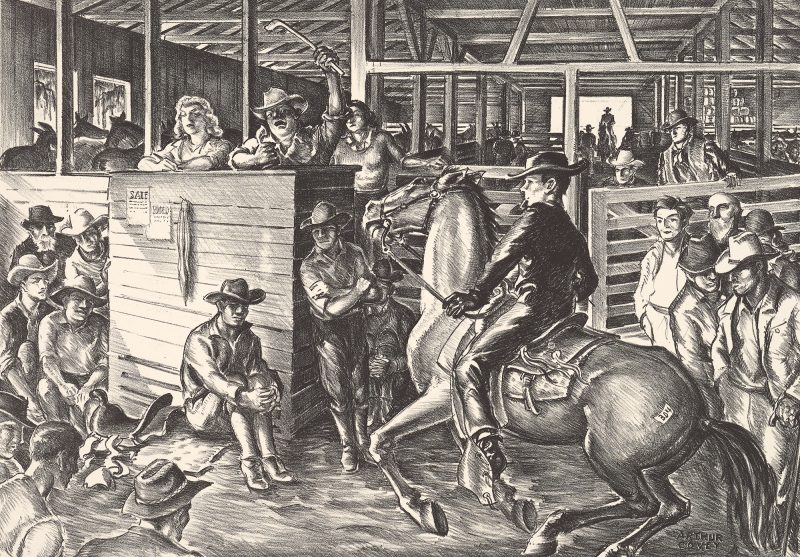 A cowboy on horse with buyers in the ring and more, behind in the barn, looking on