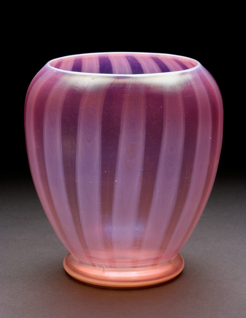 Variation on shape #5017 Ovoid body with pink vertical opalescent stripes.