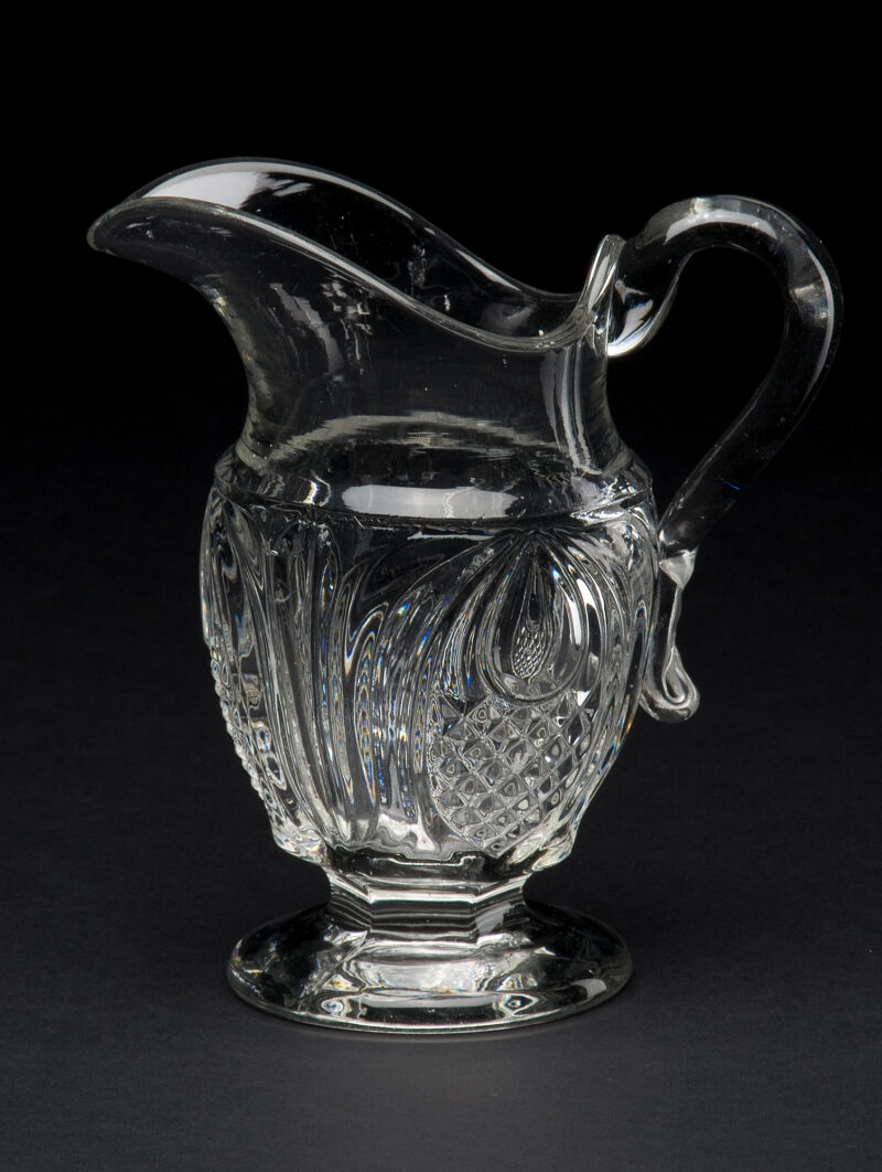 Clear pitcher in New England Pineapple pattern.