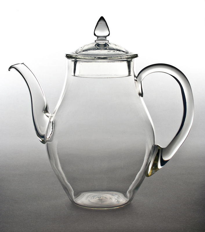 Hand-blown pyrex glass teapot with lid.