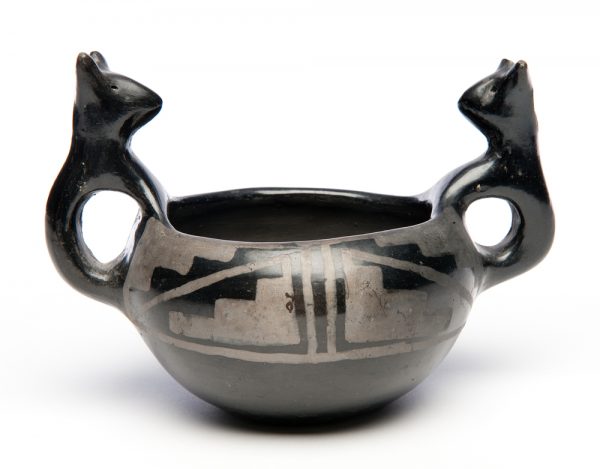 Black on Black bowl. 1 1/2” band of step design with two stylized bears as handles.