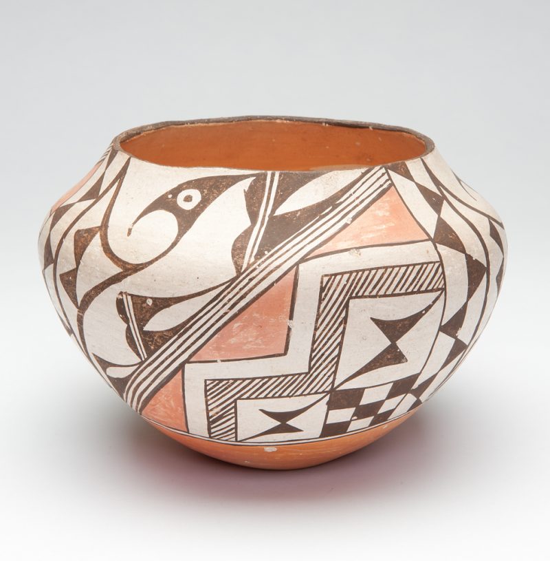 White background with brown outlines of stylized birds and geometric patterns with rust color accents.
