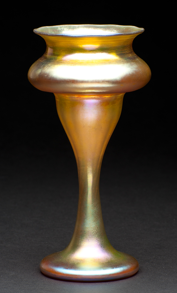 shape #243, A vase that has a medium rounded foot, narrow stem and rounded double bowl, ending with a dark rimmed lip.