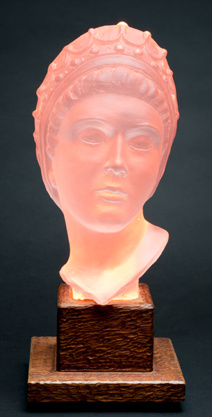 Clear cast glass female head.