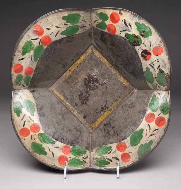 Tole painted metal bowl with four corners. The decoration is of orange fruit, green leaves.