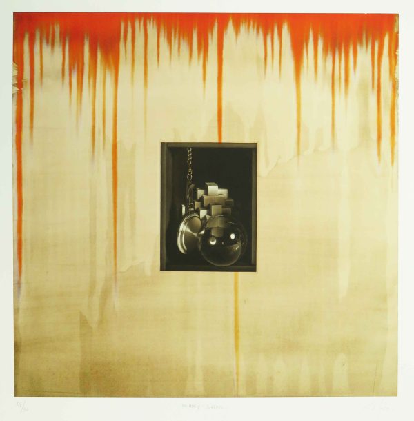 A 5 1/2 x 4 1/4 inches mezzotint (copper plate) printed in black ink is centered on a background of tan with a pattern of orange dripping from the top edge. The mezzotint is of a reflective bubble at lower right, a hanging watch seen from the back at lower left, and in the background are various stacked blocks. The artist describes it as a hybrid combination of multilayered prints that combine digital abstractions with handmade illusionistic representation.