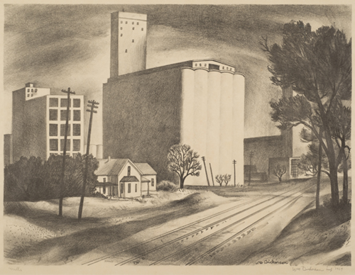 A house stands in front of white wheat elevators. There is a train track running from bottom center to the right edge of the image.