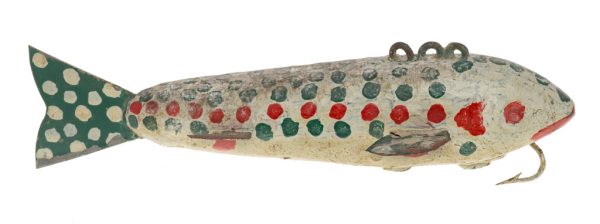 Gray fishing lure with green and red spots. The tail is green  with white spots. One hook is below the mouth, and three metal hoops to tie onto the top.