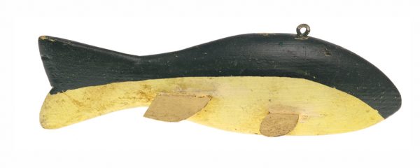 A wood fishing lure with a dark green top half, yellow belly and metal fins. It has no eyes.