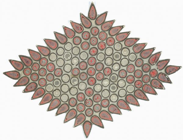 A diamond shaped penny rug with leaf or teardrop shaped pieces in the outer border. the colors are reds and brown on a tan ground