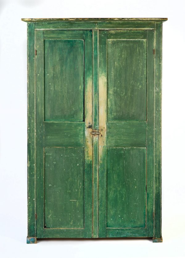 A two door green cupboard with five shelves.