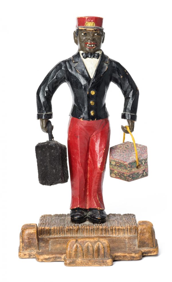 Cardholder Bell Boy. A bell hop carries two pieces of small luggage. He wears a red hat and pants, black jacket and white shirt.