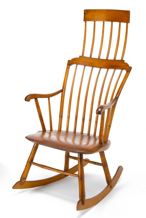 A Shaker style rocking chair with two-tiered back.