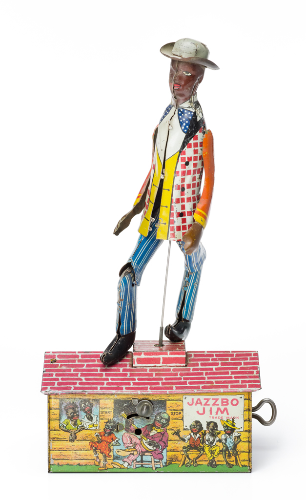 A nattily dressed man dances on top of a house