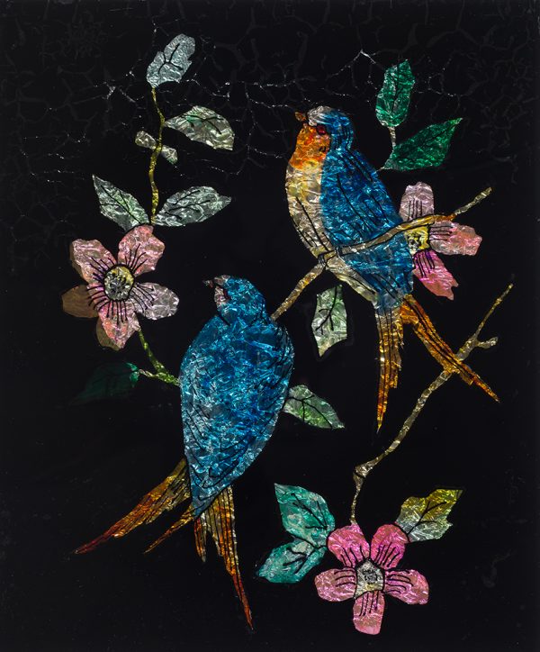 Two birds on flowers