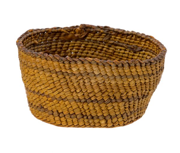 Small twinned plant fiber basket with wide mouth and slight taper to foot. Wrapped fibers are undyed with a three rows of darker brown design and darker brown around the rim.