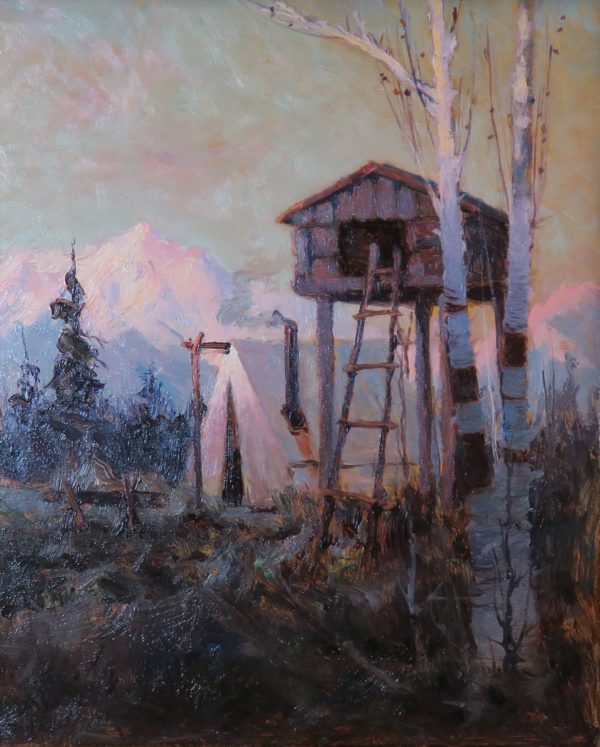 A tent is pitched beside a cache (in the context of the western landscape, meaningn a small cabin on tall stitls.) A ladder rests against an open door of the cache. A stove-pipe extends from within the tent. In the background are snow covered mountains, in the foreground are several birch trees.