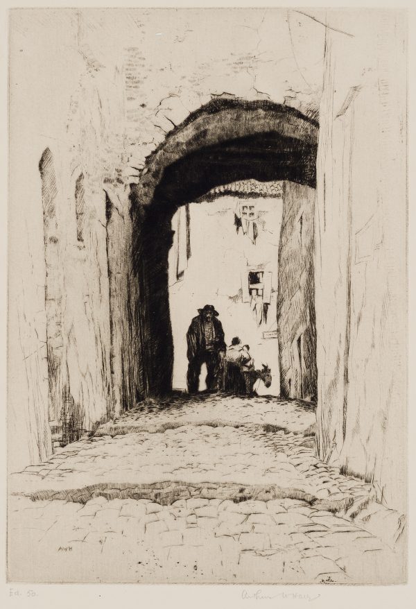 A man with a hat and a cane stands below an arch in the shadow. Behind him are two women and a donkey.