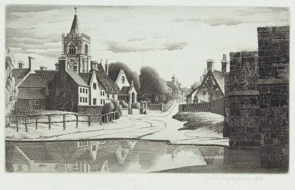 English series no. 3. A road leads througha village with buildings on each side, including a church on the left.