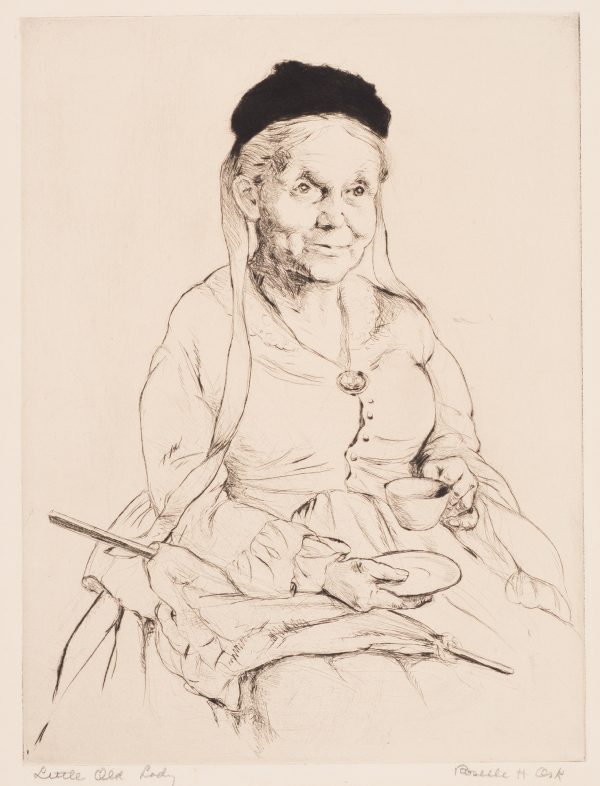 A seated elderly woman  wears a black cap, holding a cup and saucer, and an umbrella on her lap.