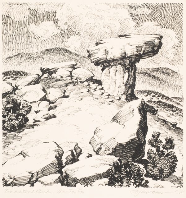 A rocky landscape featuring a boulder in the form of a toadstool.